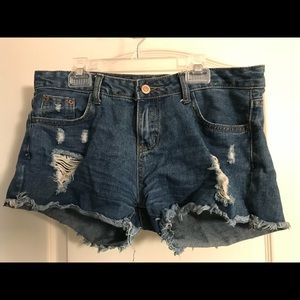 Blue distressed denim jeans